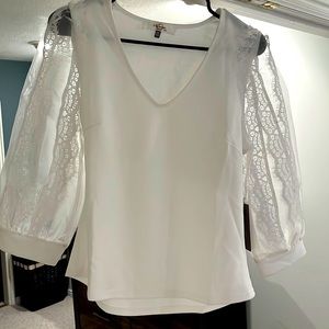 White dressy lace top.